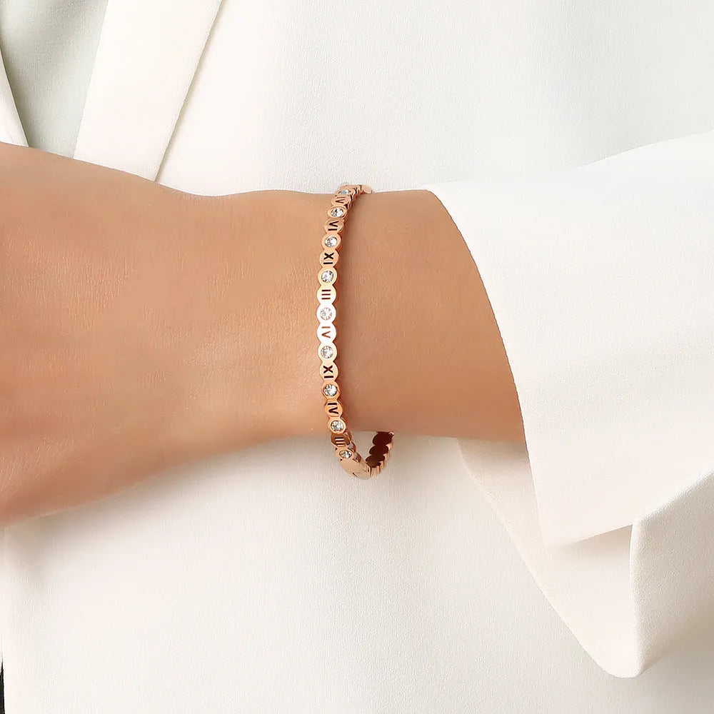 Korean style titanium steel bracelet with number detail in gold, rose gold, or steel colour.