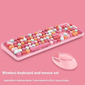 Wireless keyboard and mouse set on a desk, shown in a mixed colour option.