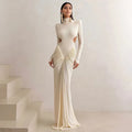 Women's slim fit long sleeve dress with high collar and pleated backless detail in solid colour