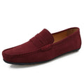 Men's solid colour suede leather slip-on loafers with round toe and flat rubber sole.