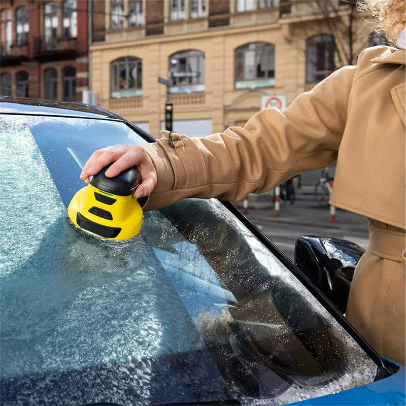 Yellow cordless electric ice scraper with USB charging cable for car window de-icing