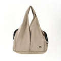 Apricot-coloured cloth pet handbag for small dogs measuring 41x16x28 cm