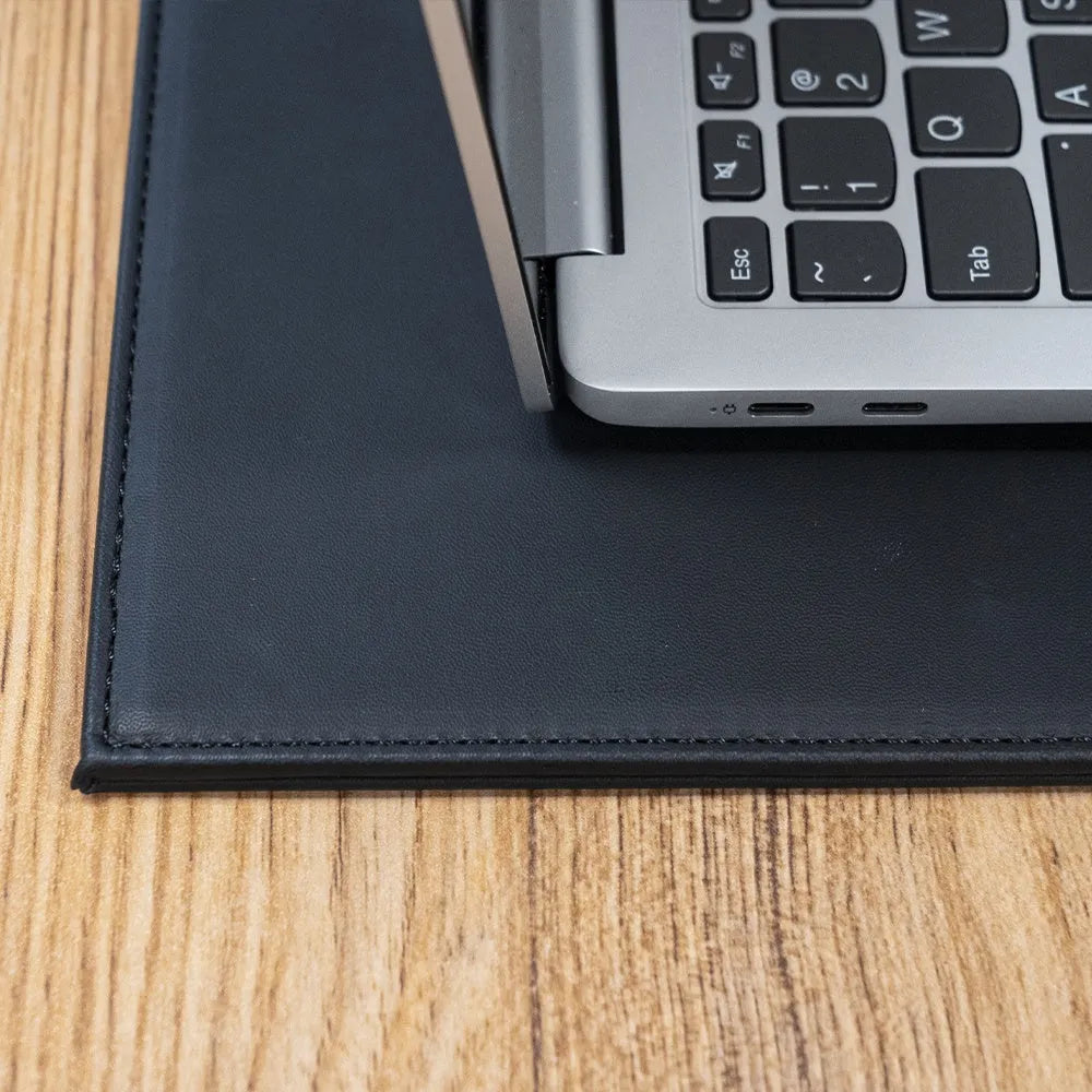 Anti-radiation printing tablet pad in multiple colours on a desk with a printer.