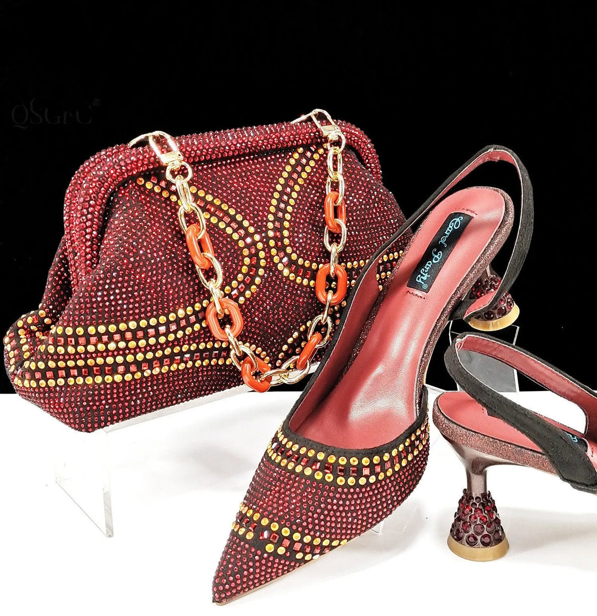 Women's pointed toe high heels with matching small handbag in synthetic leather