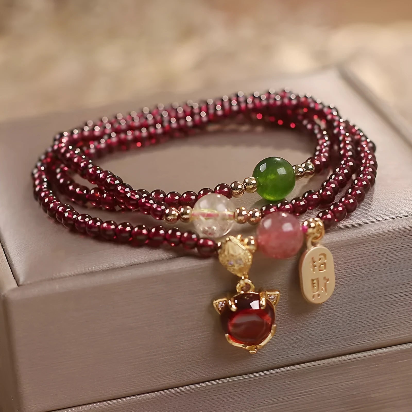 Purplish red garnet fox charm bracelet with adjustable rope closure for women