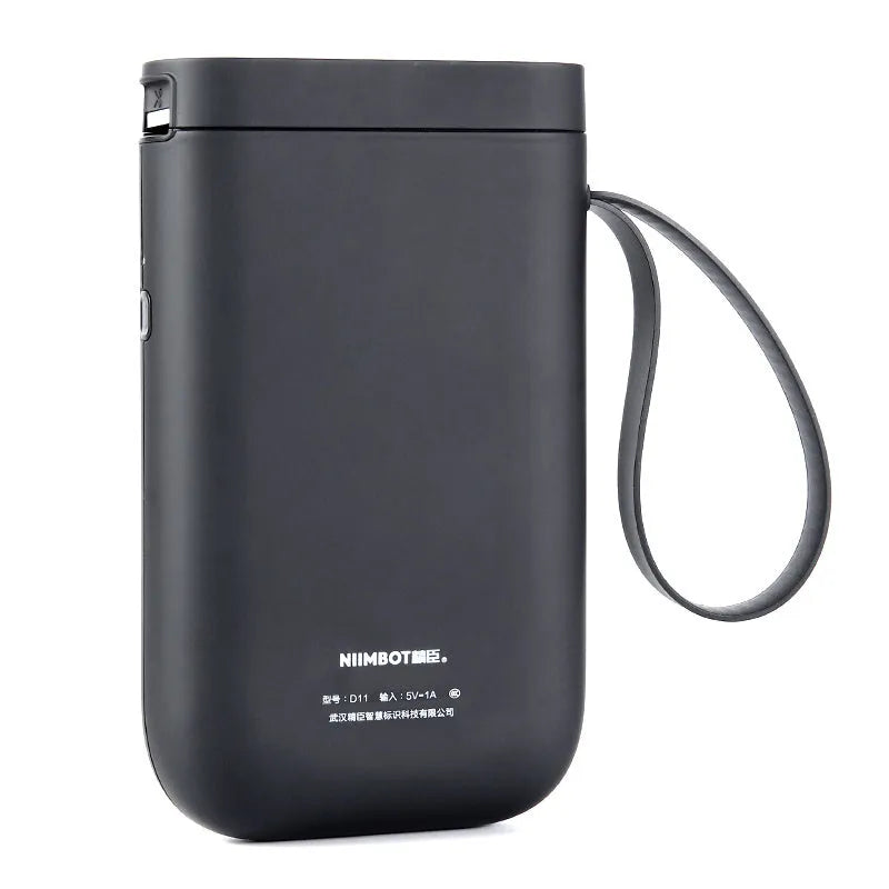 Compact D11 Bluetooth thermal label printer in black, with smartphone showing label design app.