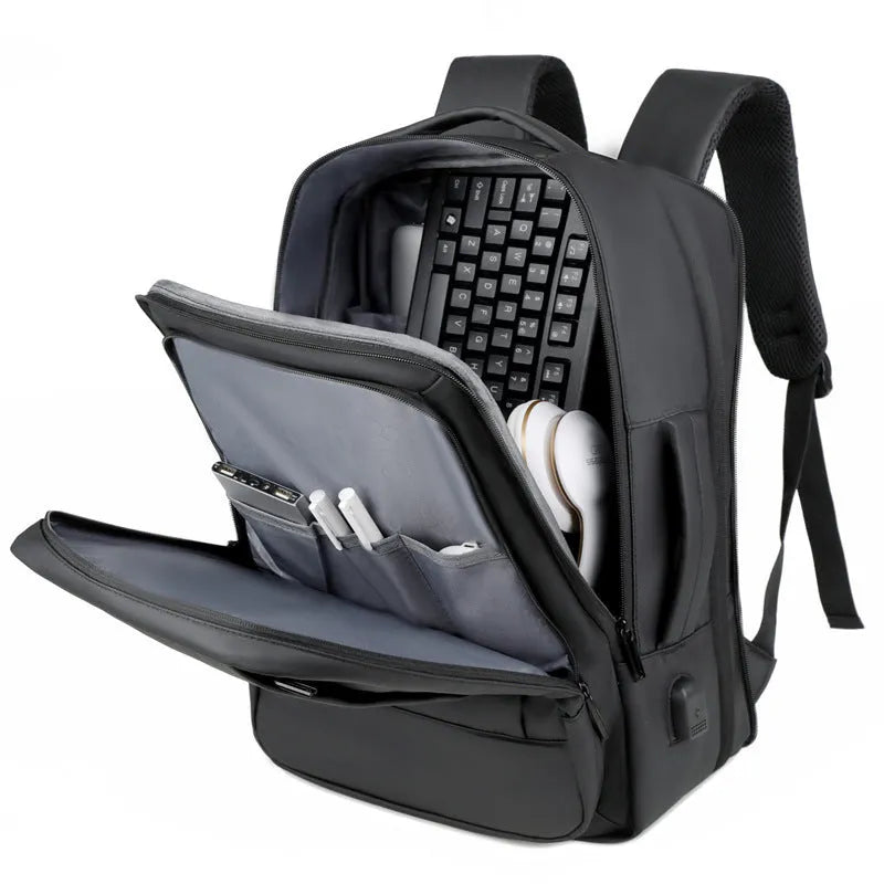 Men's black and grey waterproof Oxford cloth backpack with curved shoulder straps for business and outdoor travel