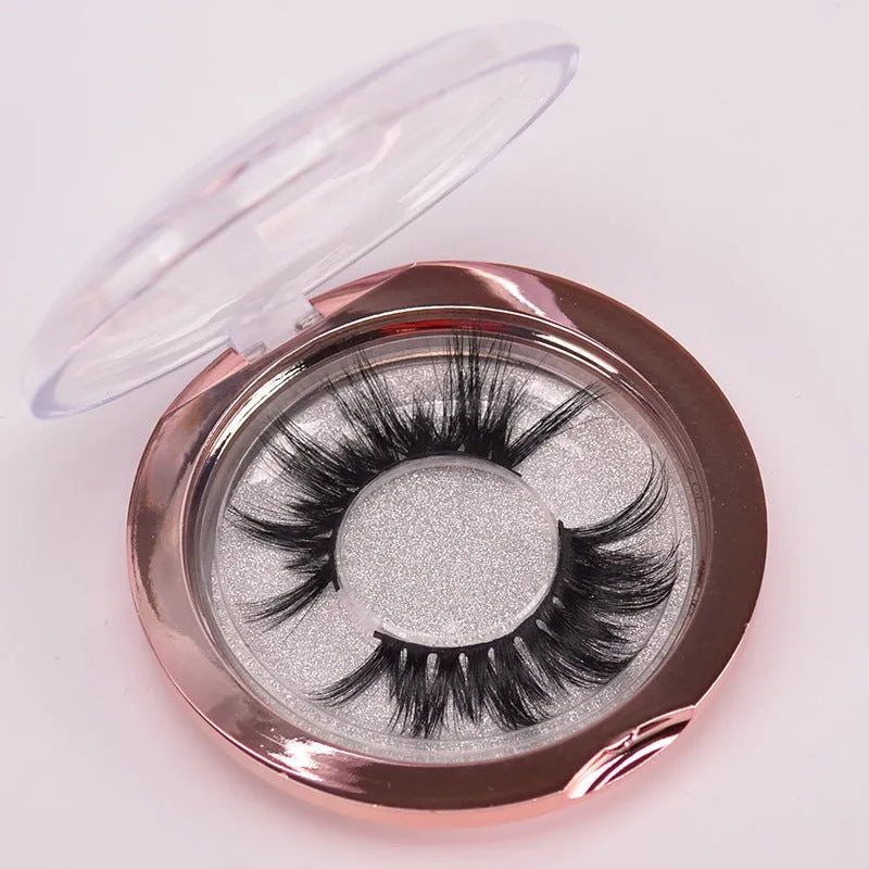 Affectionate brand 5D mink false eyelashes set with storage case and brush on a white background.