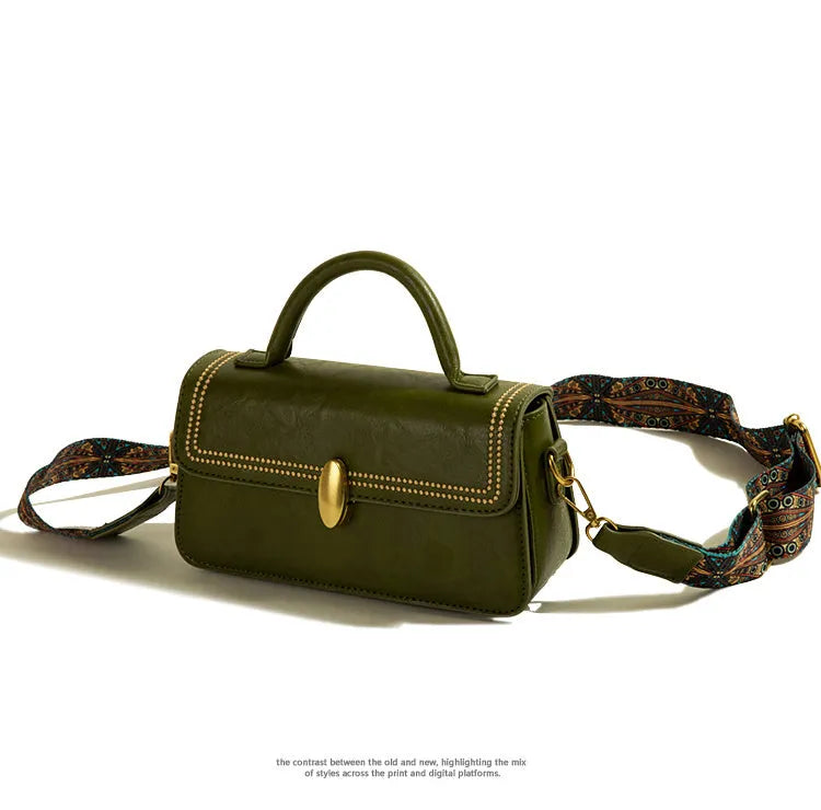 Brown retro texture women's messenger bag showing front sandwich pocket and shoulder strap.