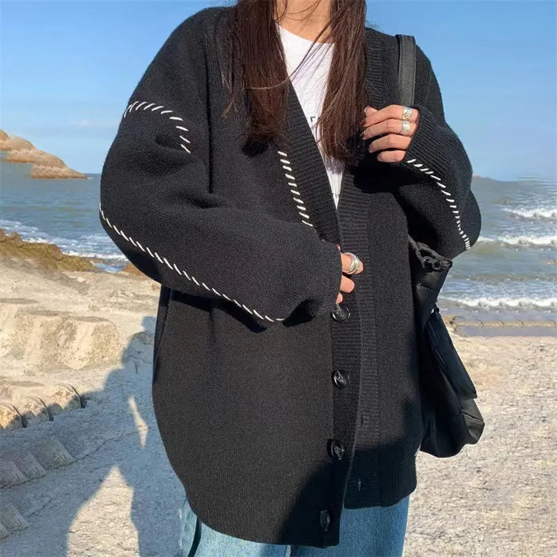 Women's knitted cardigan top coat in loose fit free size available in black or white solid colour