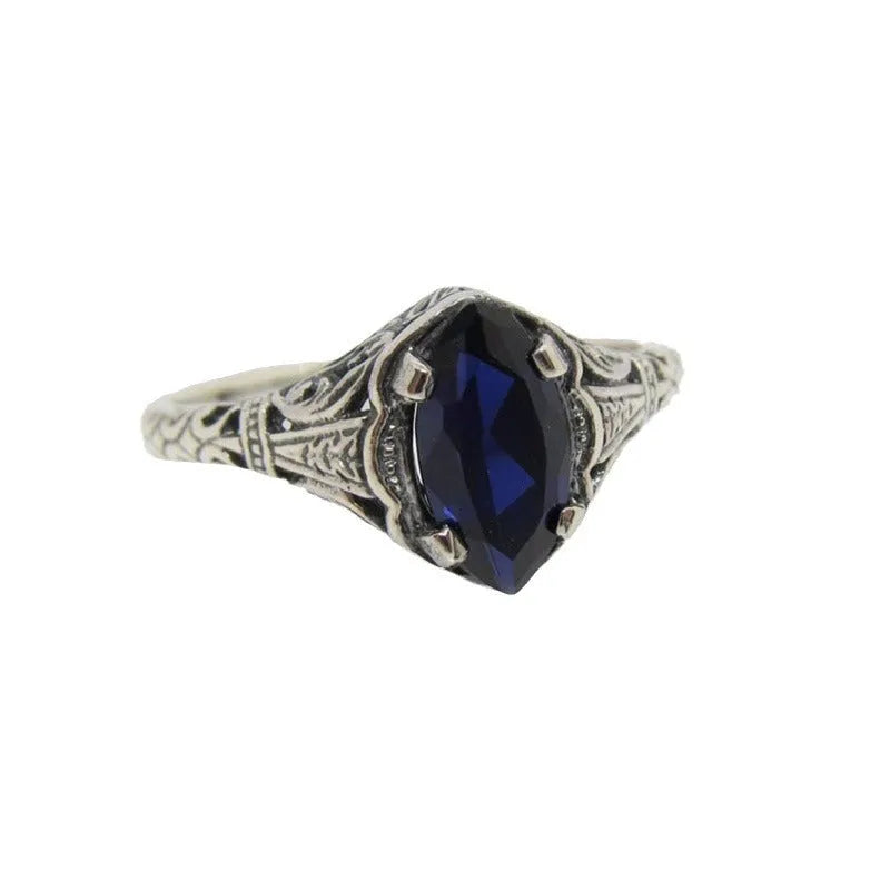 Silver geometric hollow alloy ring with zircon detailing shown in women's sizes 5 to 11