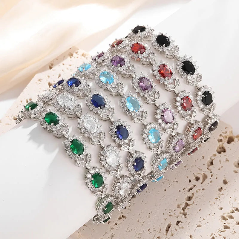 Women's simple bracelet with inlaid zircon gemstone on an electroplated environmentally friendly alloy band.