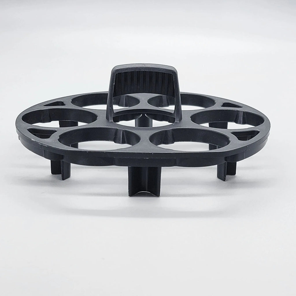 Black plastic egg holder for cooking machines measuring 13.8 by 12.6 by 5.7 cm