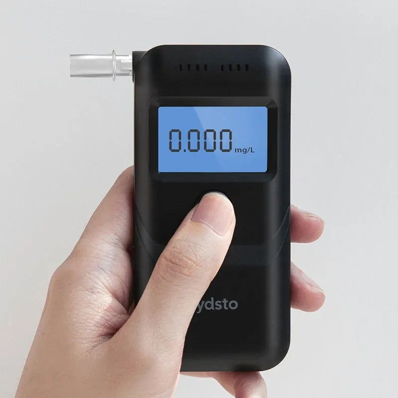 Black handheld alcohol breath tester device for personal drinking level checks