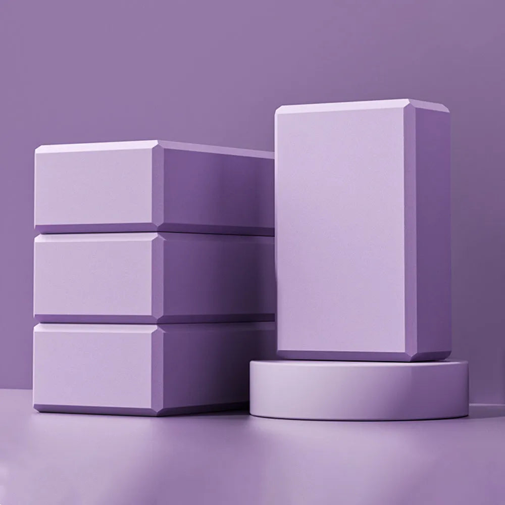 Solid colour EVA foam yoga blocks measuring 23x15x7.6cm for gym training and Pilates