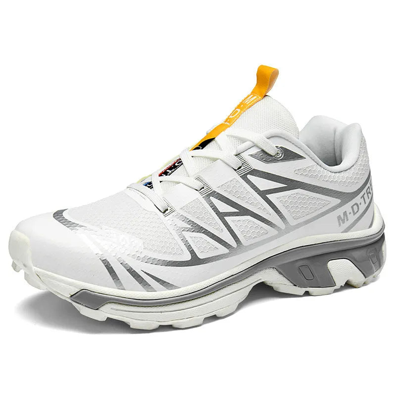 Men's and women's low-top hiking shoes in khaki colour with round toe and lace-up front.