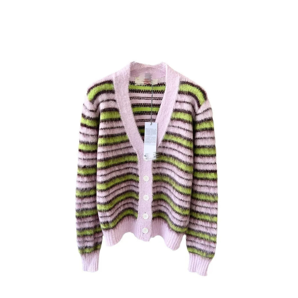 Pink wool lazy coat Haima cardigan sweater with nap craft texture on a hanger.