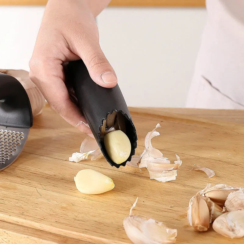 304 stainless steel garlic press in modern design with 11cm by 7cm dimensions