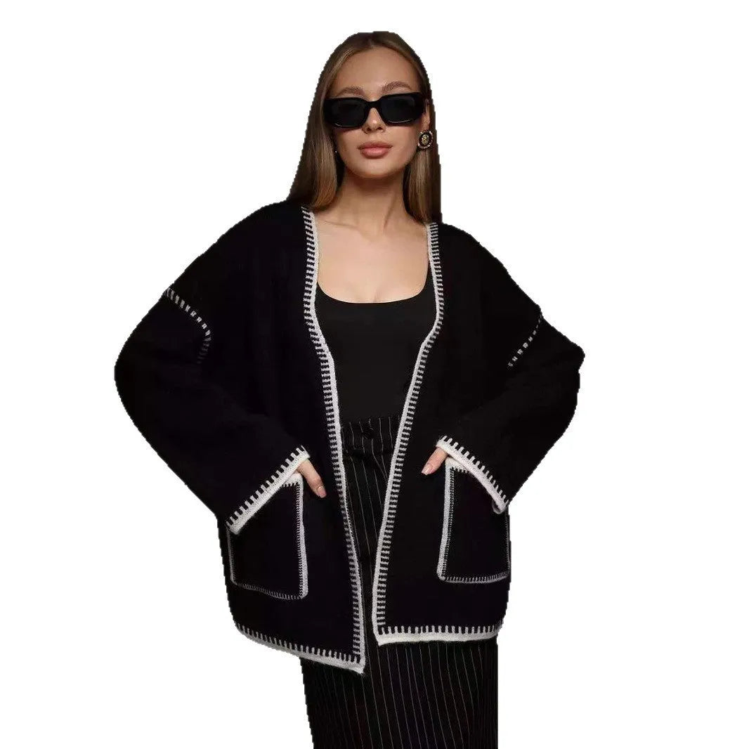Loose fit knitted cardigan with lace-up front detail in thick imitation cashmere cotton fabric.