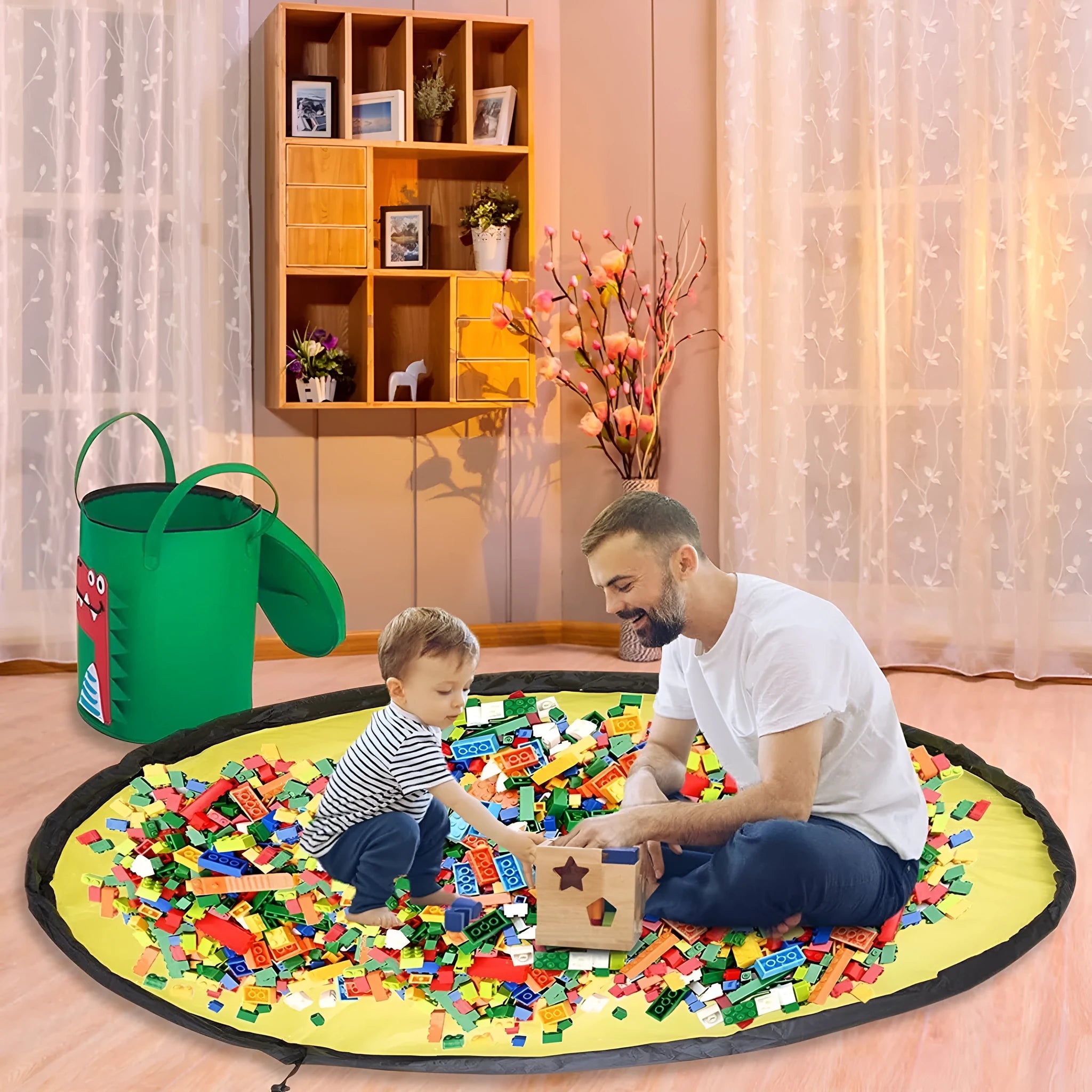 Green felt cube storage bag with pull rope, laid flat as a play mat