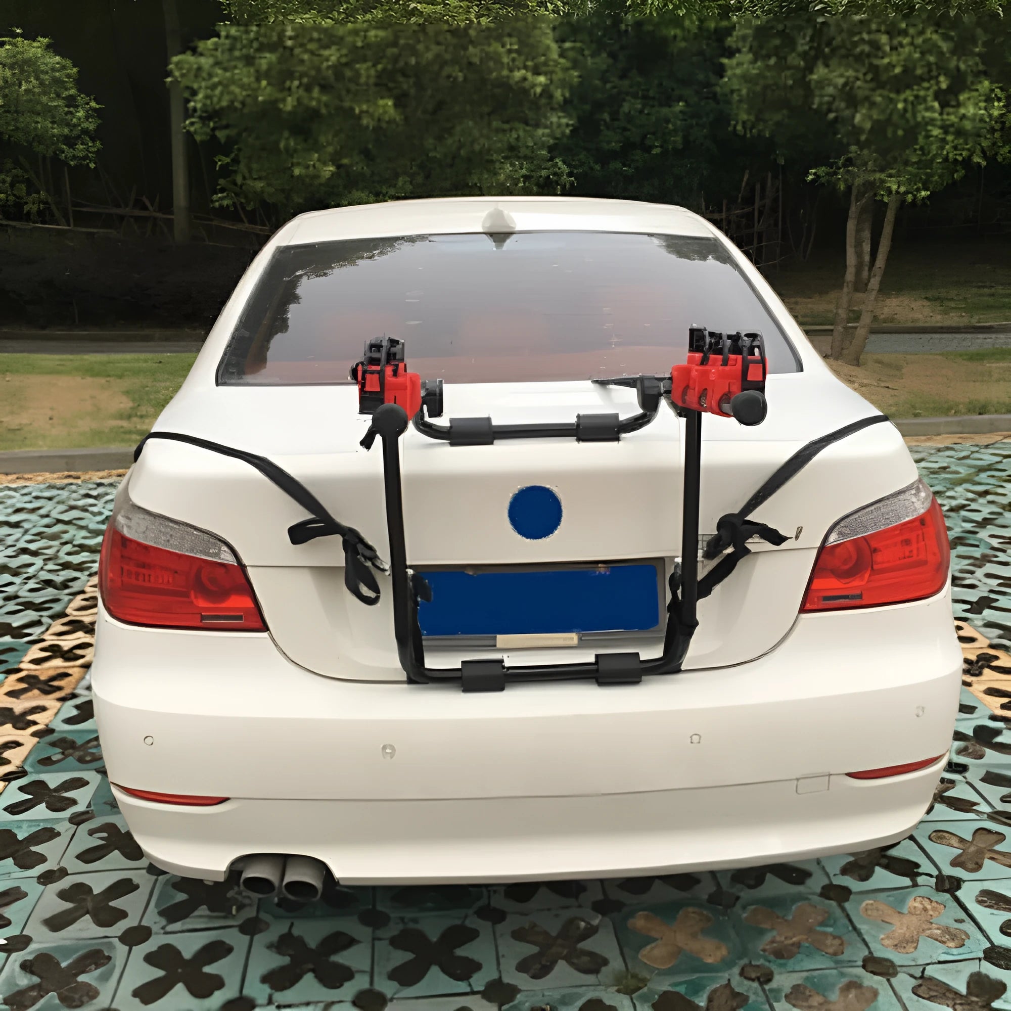 Black and red trunk mounted bike rack with protective sponge layer on car boot