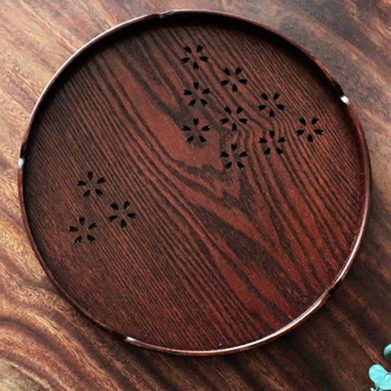 Wooden round shallow plate with hollow Sakura cherry blossom pattern, 30cm diameter.