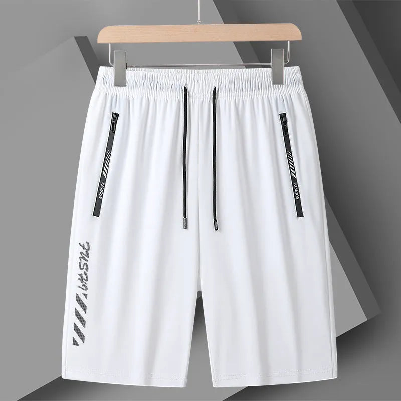 Men's black loose-fit nylon sports shorts with elastic waistband on a hanger