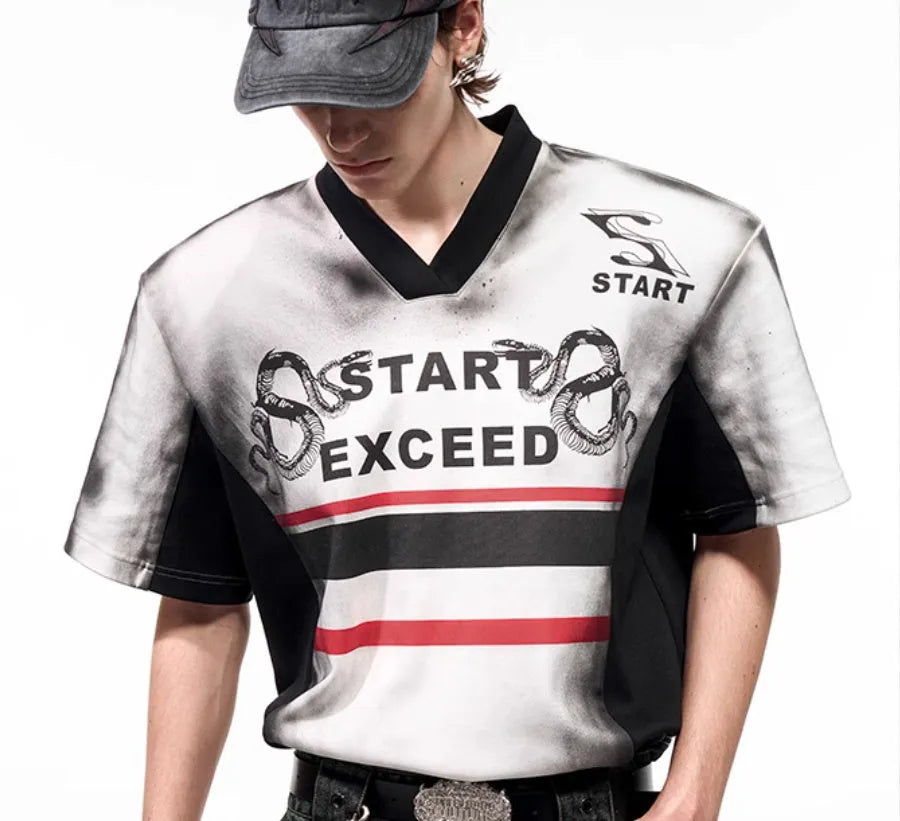 V-neck short sleeve polyester top with padded shoulders and letter snake pattern print in refined Korean style