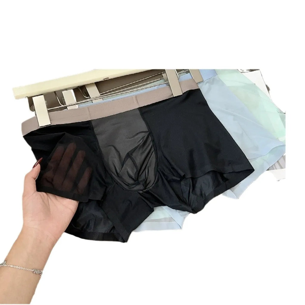 Ultra-thin nude colour men's boxer shorts with seamless design and honeycomb crotch detail.