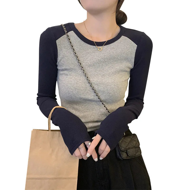 Dark blue women's oversized viscose top with long princess sleeves and embroidery detail