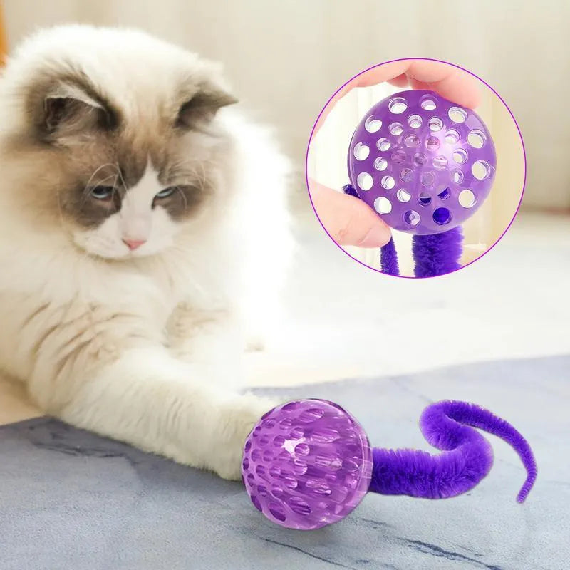 Interactive bouncy ball cat toy with soft plush worm tail in green, pink, or purple colours