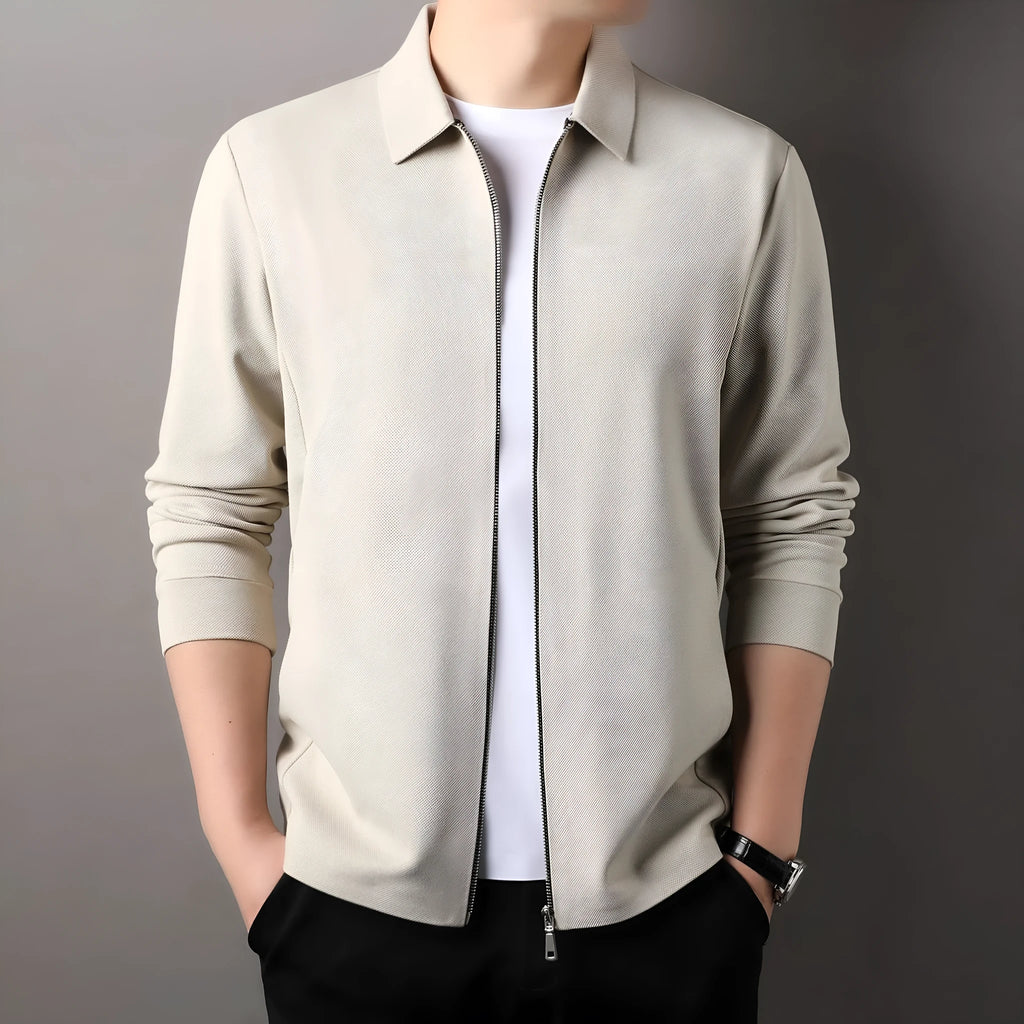 Men's apricot coloured business casual polyester jacket with straight hem on a hanger.