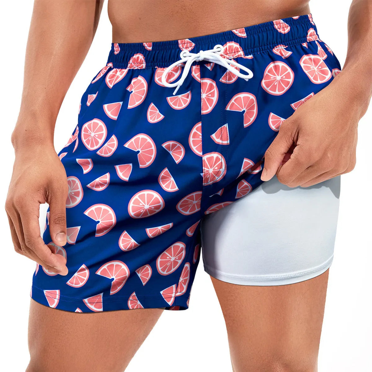 Men's loose quick-drying swimming trunks in floral pattern with boxer-style cut