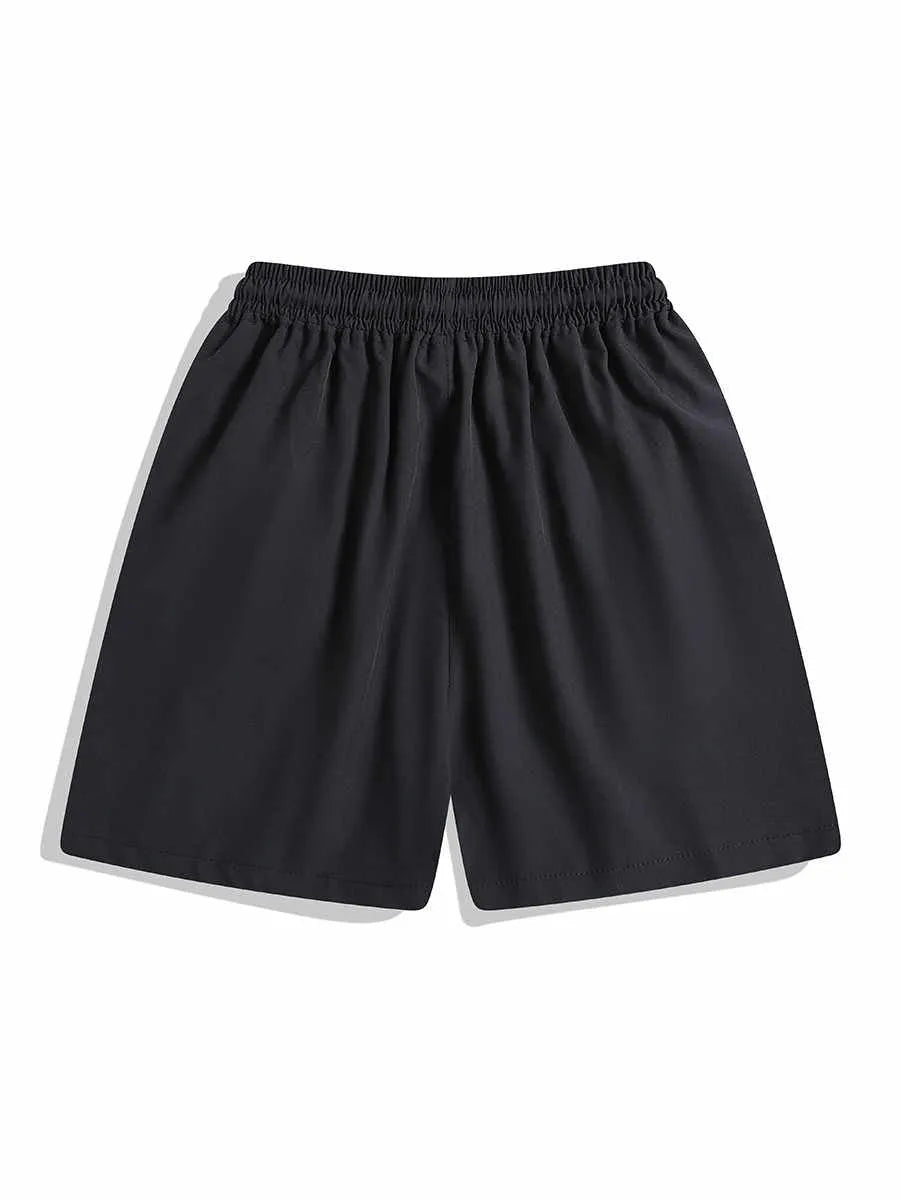 Men's loose fit quick-drying sports shorts in grey with elastic waist, shown above the knee.