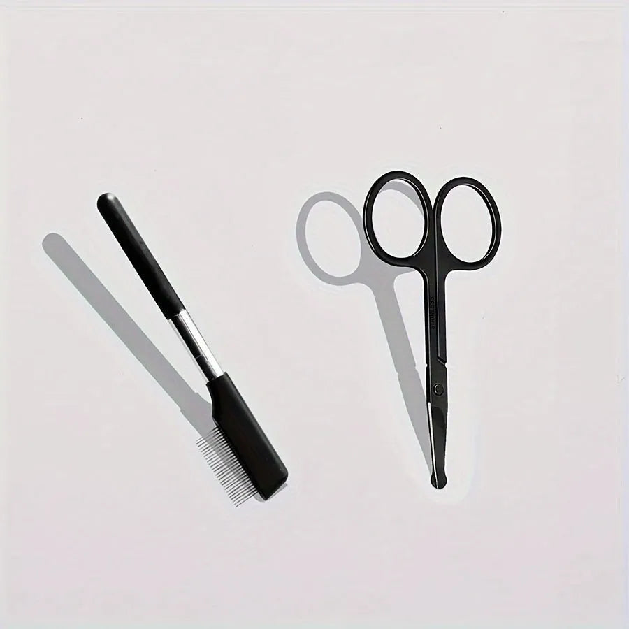 Black handheld pet grooming brush with a soft silicone head for eye tear stain removal.