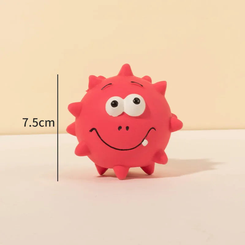 Set of four colourful natural latex squeaky dog balls with cute faces, shown with a dog.