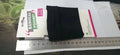 Wrist bag armband sleeve for mobile phone with adjustable strap, shown in packaging
