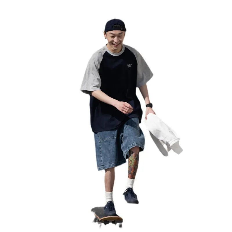 Japanese-style raglan sleeve t-shirt in blue, green, and grey colours with loose fit design