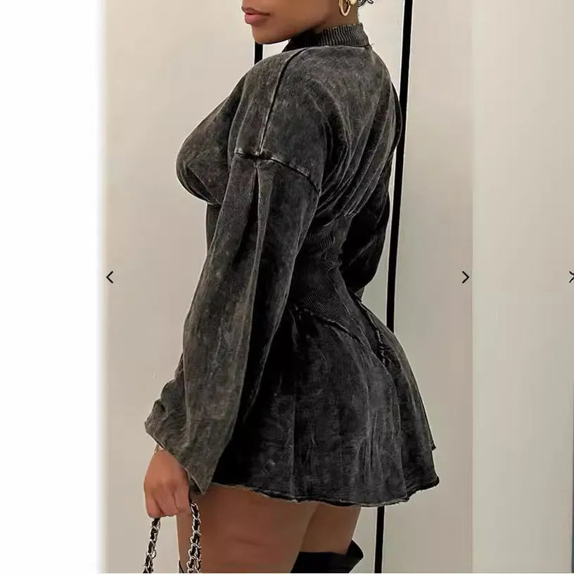 Grey digital print A-line dress with drawstring waist and long sleeves on a hanger