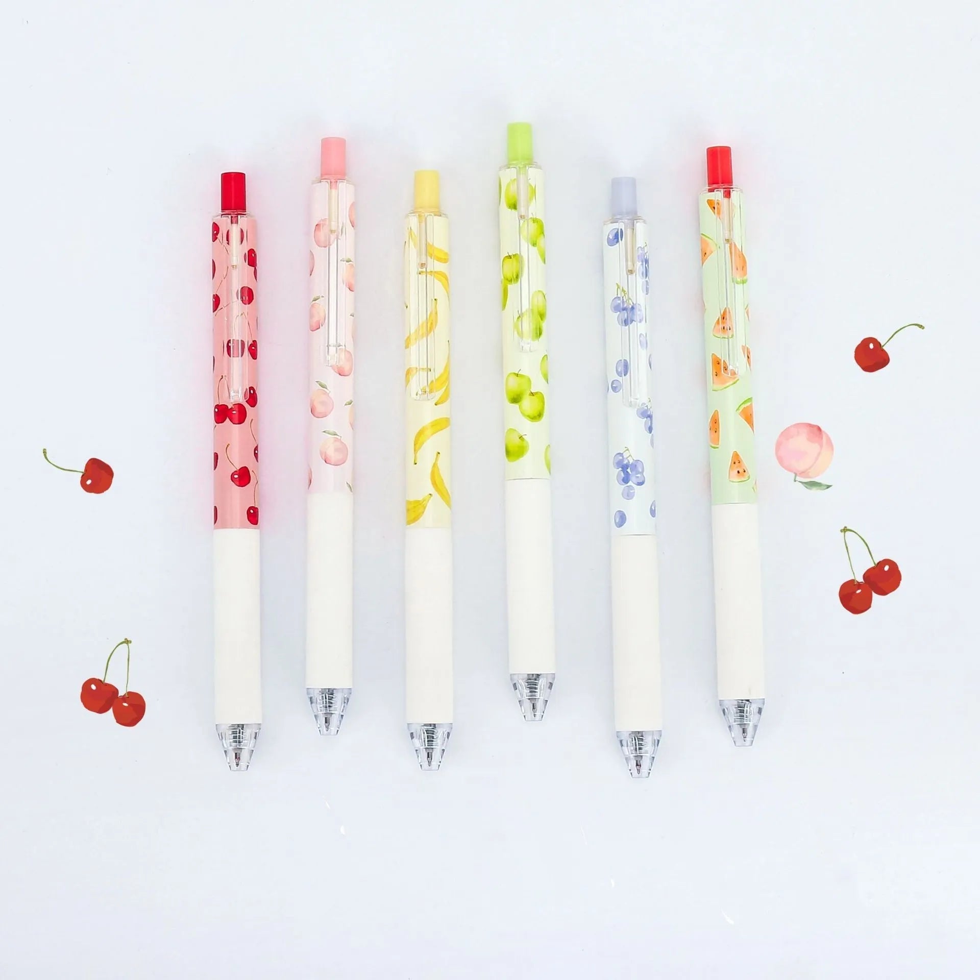 Three scented fruit flavoured press-action pens with 0.5mm black ink refills