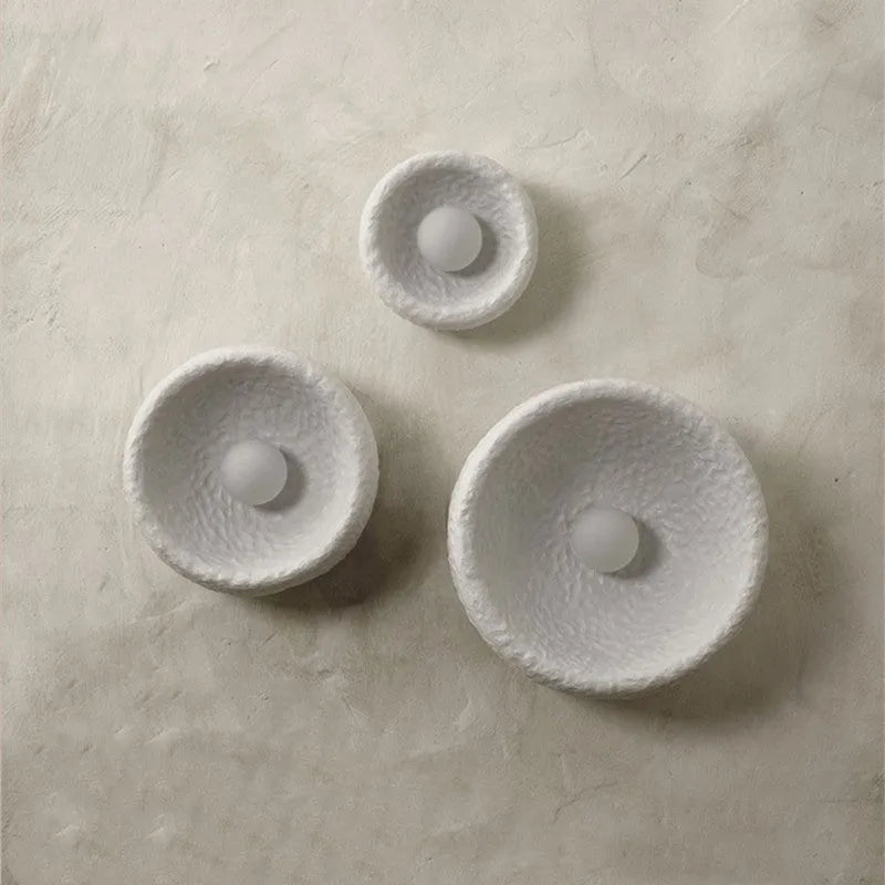 Japanese minimalist wall lamp with round resin shade in warm white light