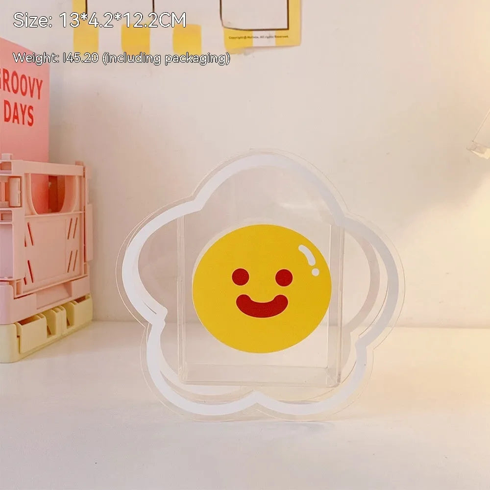 Square clear acrylic storage box with a cute cartoon strawberry rabbit design on the side.