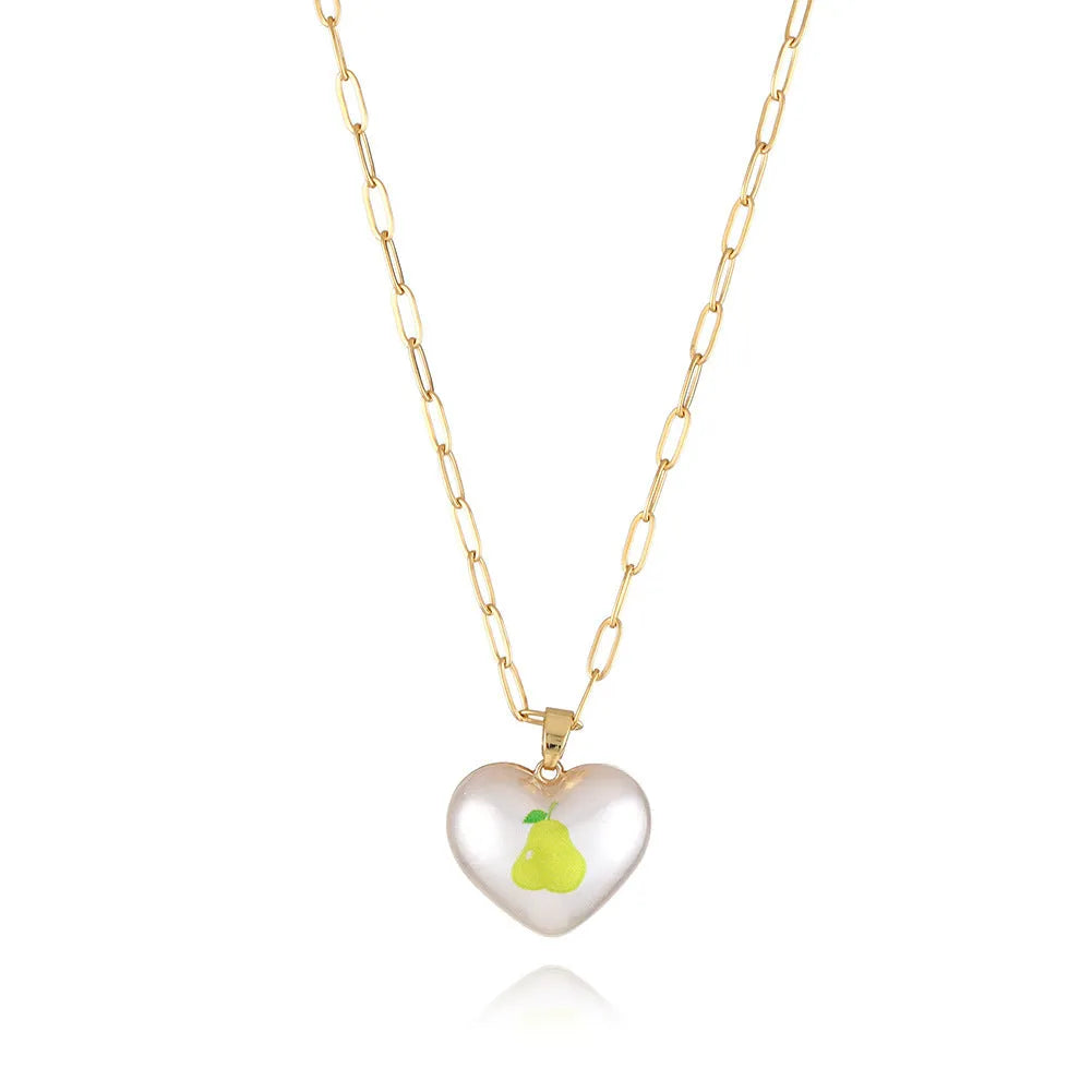 Adjustable heart necklace showing geometric fruit pendants: apple, pineapple, strawberry, cherry, and pear.