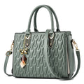 Women's polyester shoulder messenger bag showing large capacity and multiple pocket organisation