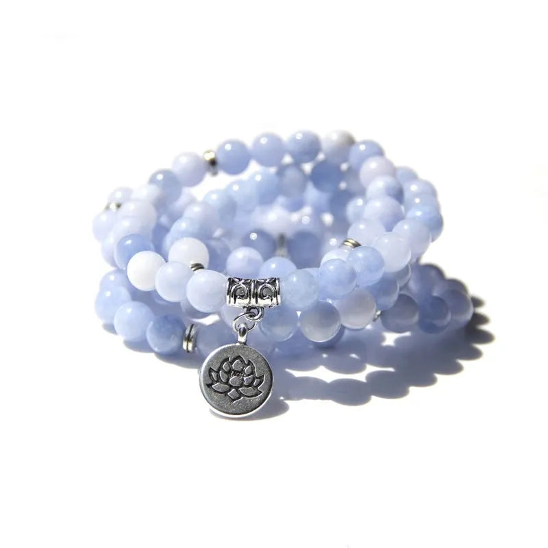A vintage-style women's bracelet made from natural stone with a geometric lotus design.