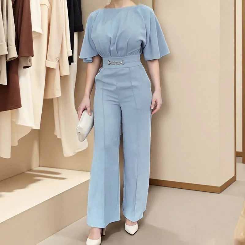 Blue men's polyester business suit with trousers and long-sleeved jacket on a hanger