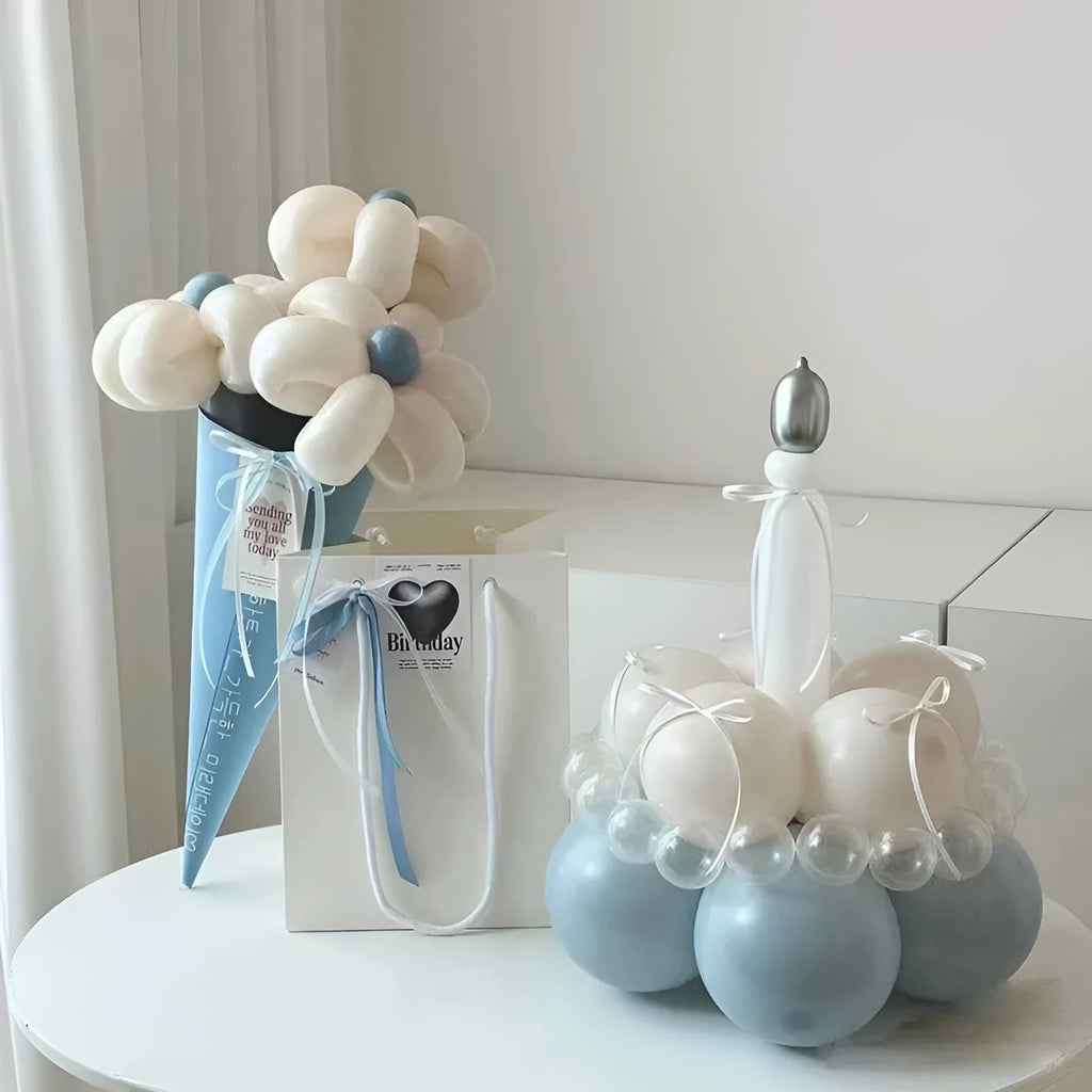 DIY balloon bouquet cake kit with assorted coloured balloons and a clear centrepiece balloon for party decorations.