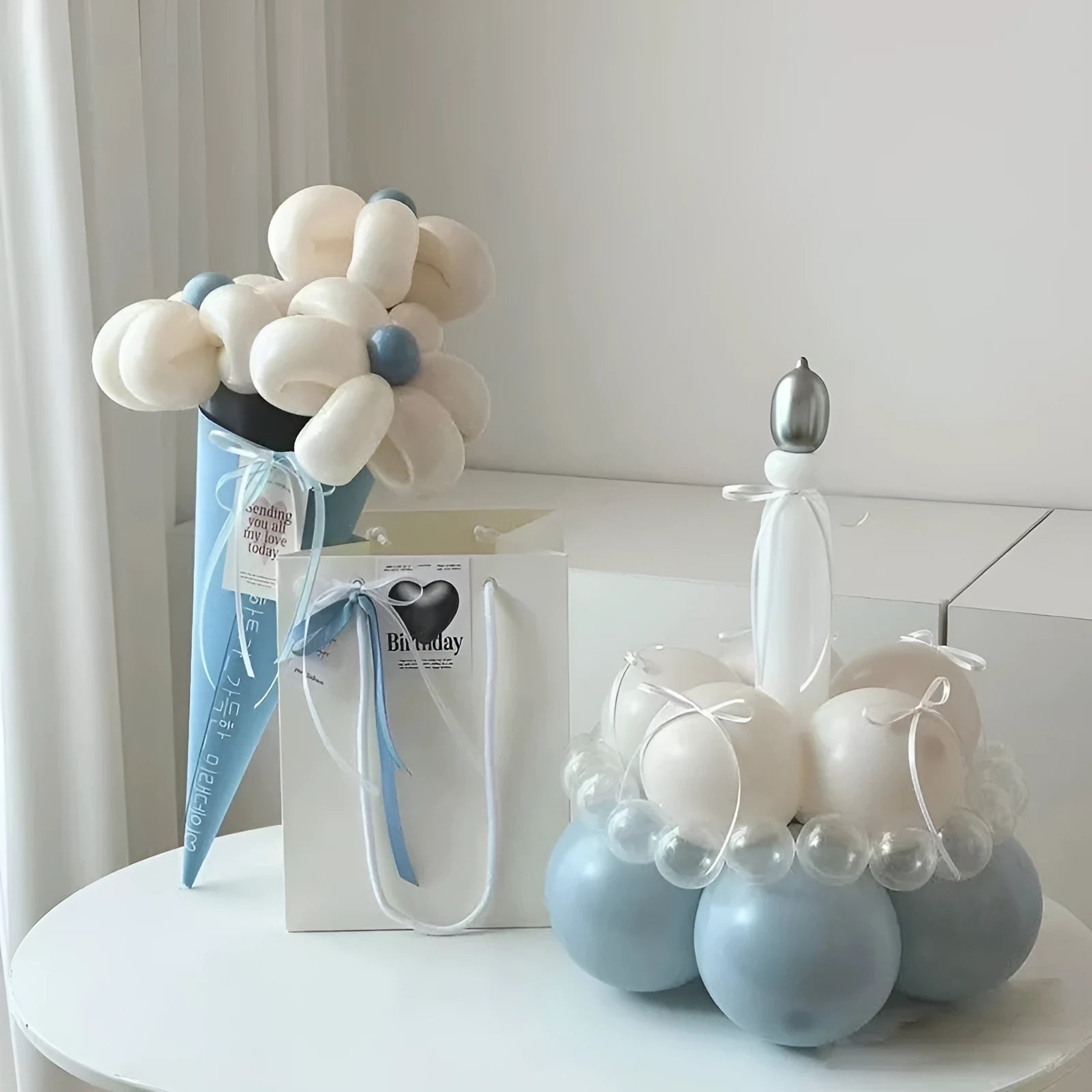DIY balloon bouquet cake kit with assorted coloured balloons and a clear centrepiece balloon for party decorations.
