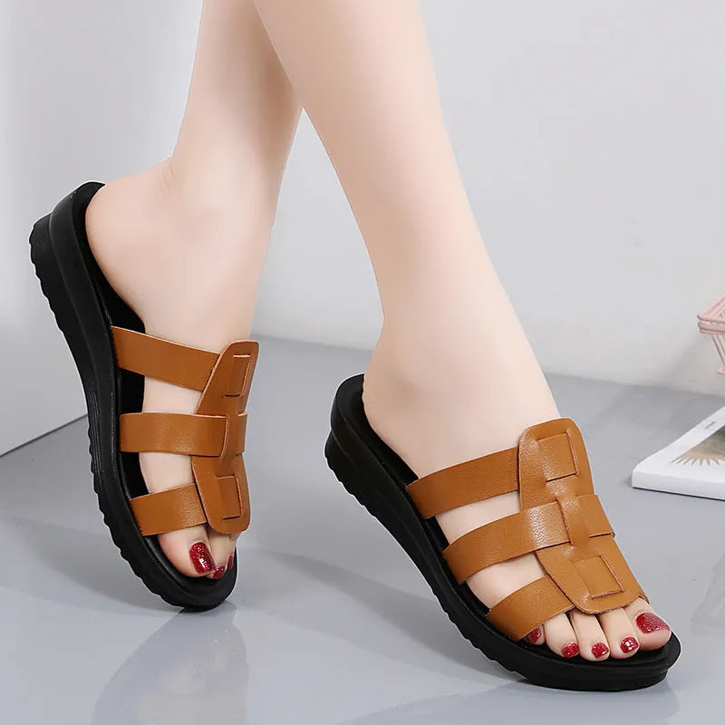Women's flat bottom slippers with waxed leather upper in beige, black, and brown colours