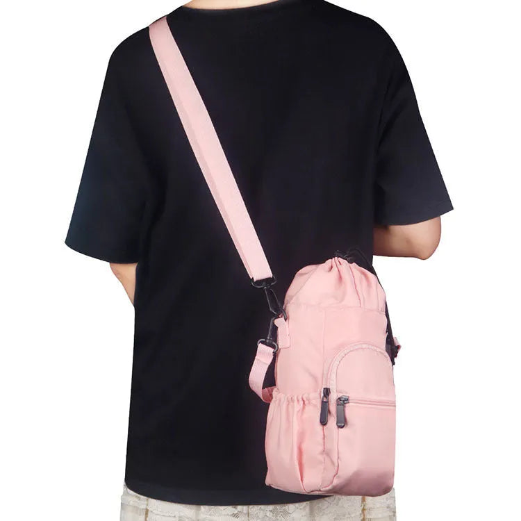 Cloth crossbody water bottle shoulder pouch in black, green, or pink.